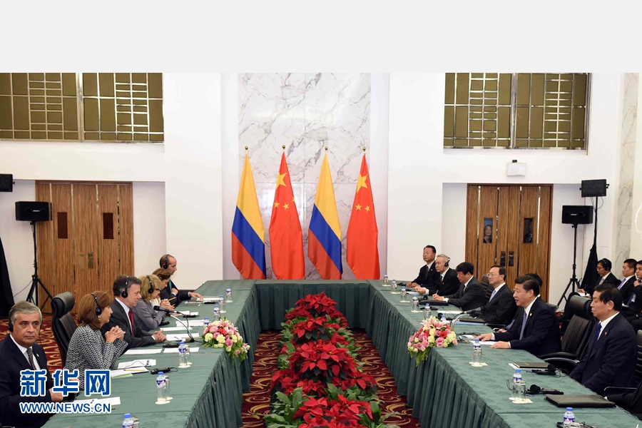 11月18日，國(guó)家主席習(xí)近平在菲律賓馬尼拉會(huì)見哥倫比亞總統(tǒng)桑托斯。 新華社記者 饒愛民 攝